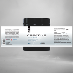 Creatine monohydrate powder container with label on a gray background