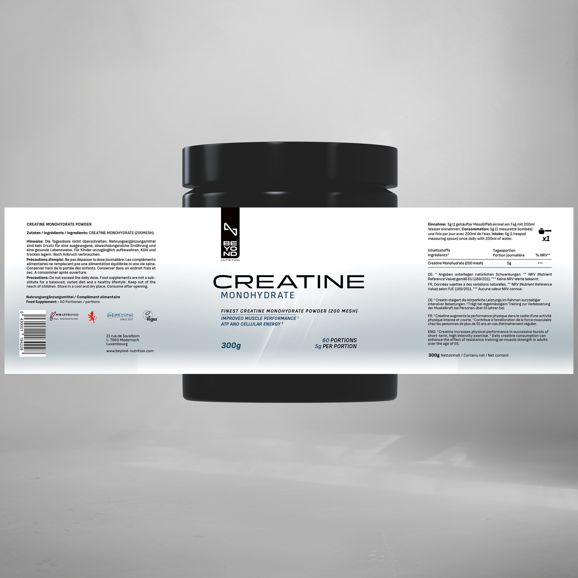 Creatine monohydrate powder container with label on a gray background