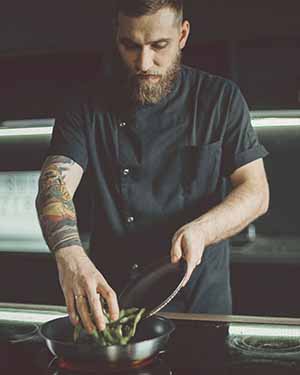 Chef preparing food in a kitchen