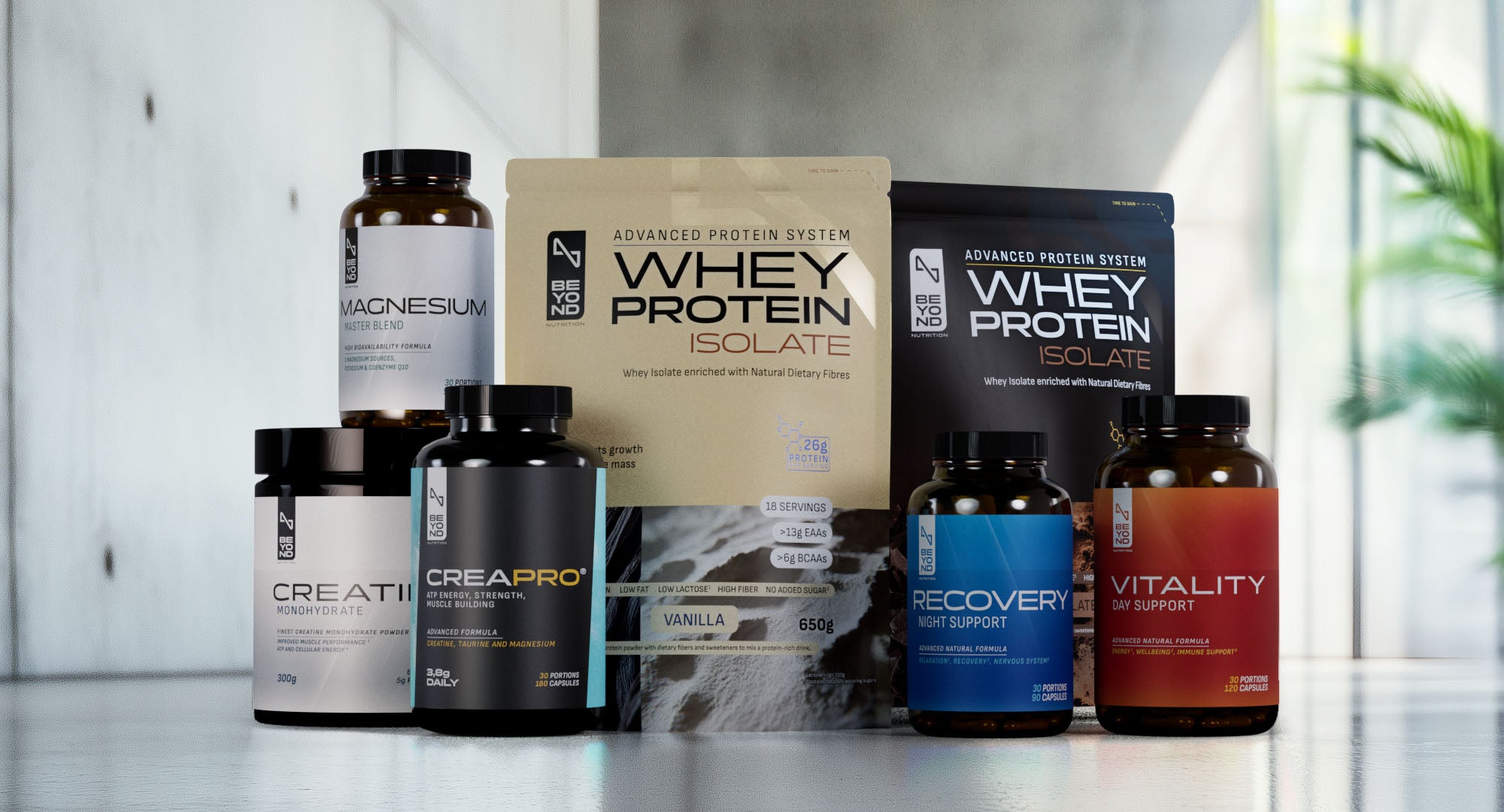 Collection of protein supplements and related products on a white surface with a blurred background.