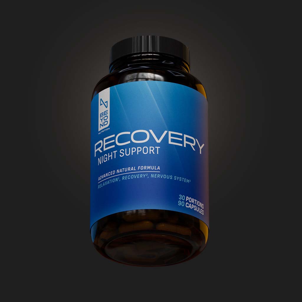 Supplement bottle labeled 'Recovery Night Support' on a dark background