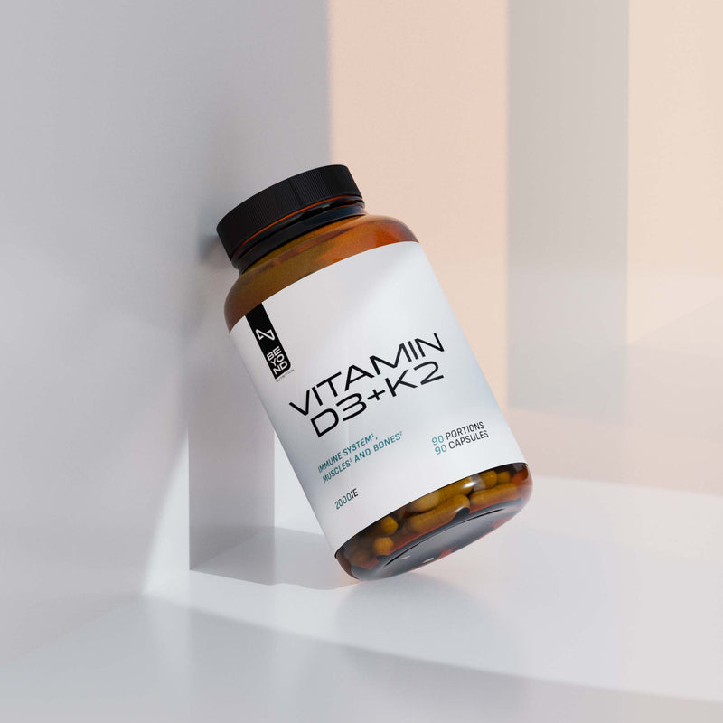 Vitamin D3+K2 supplement bottle on a light background